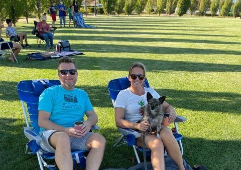 Families relaxing with their friends and dogs at Michael Vega Park in River Islands