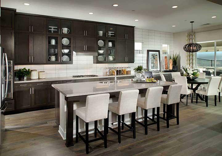 kitchen with dark cabniets and white counters