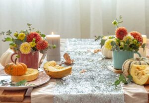 (autumn-table-setting-with-candles; 37.80226789590045, -121.32193629810645)